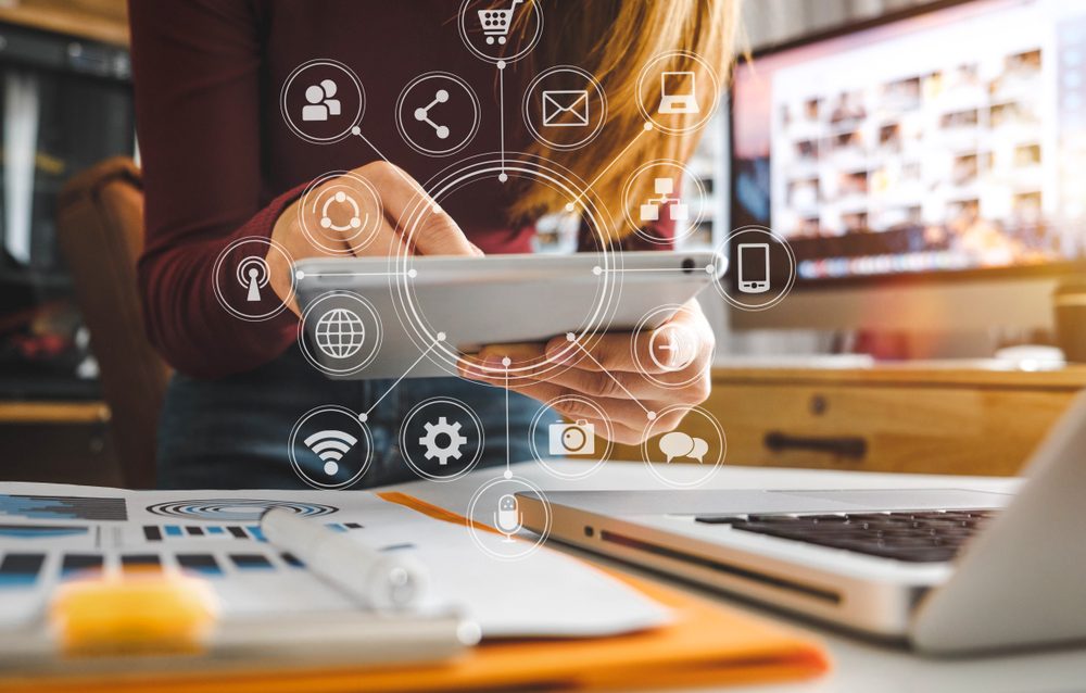 Businesswoman,Hand,Working,With,Laptop,Computer,,Tablet,And,Smart,Phone
